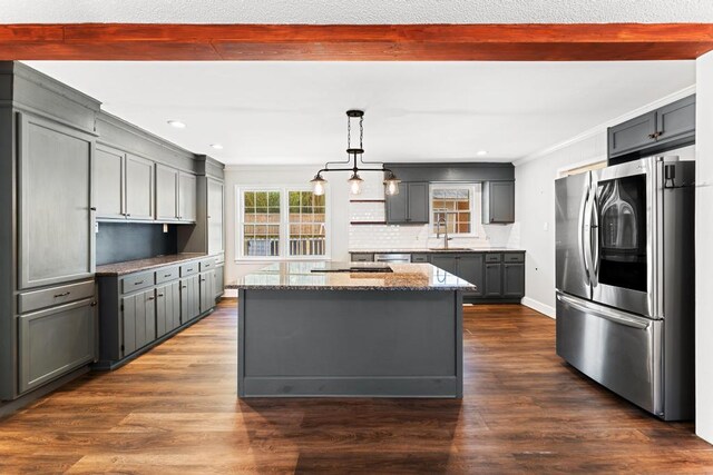 113 Woodhurst Dr, Hartwell, GA 30643 - kitchen with stainless steel appliances, light stone countertops, gray cabinetry, a center island, and recessed lighting