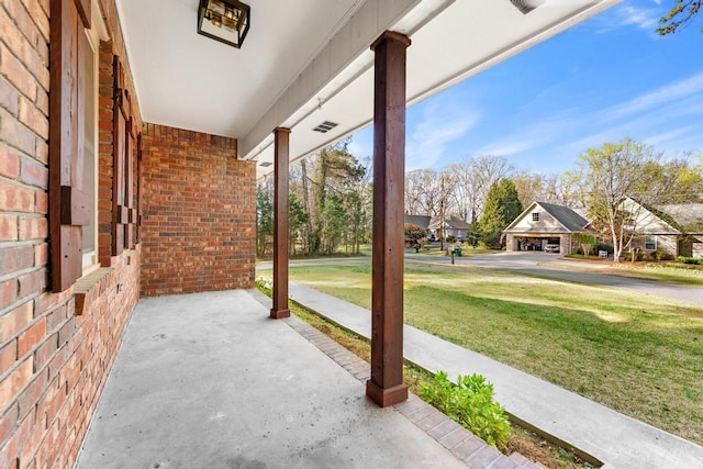 113 Woodhurst Dr, Hartwell, GA 30643 - covered porch featuring a yard and a residential view