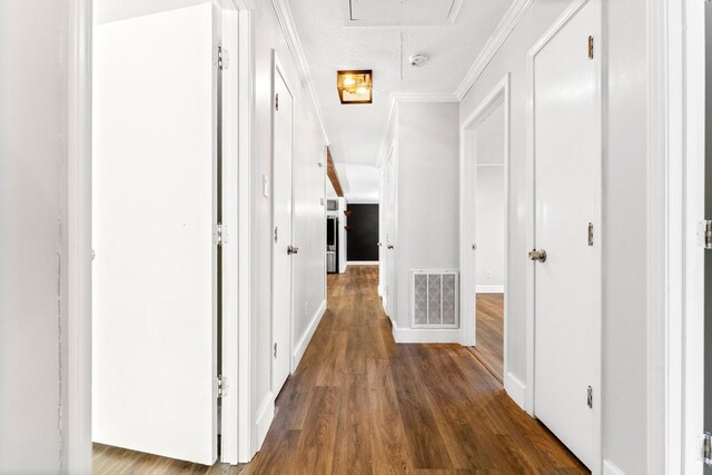 113 Woodhurst Dr, Hartwell, GA 30643 - hallway with wood finished floors, attic access, crown molding, and baseboards