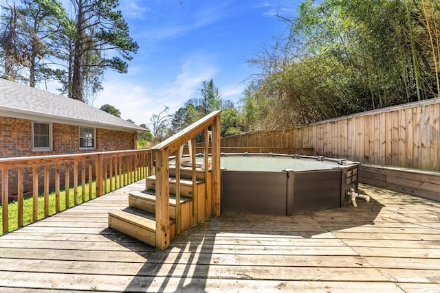 113 Woodhurst Dr, Hartwell, GA 30643 - wooden deck with a jacuzzi and a fenced backyard
