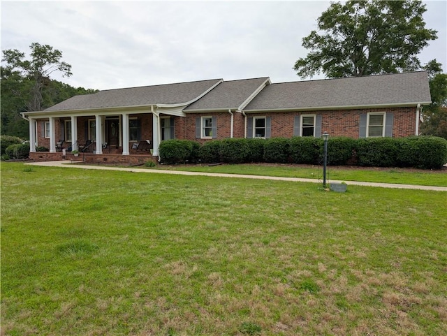 106 Emma Dr, Honea Path, SC 29654 - single story home with a front yard, brick siding, and a shingled roof