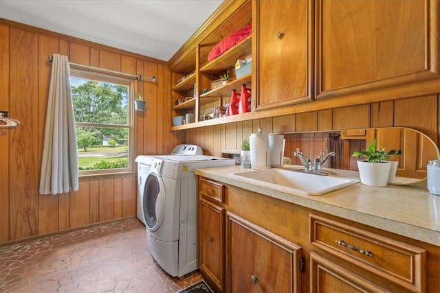 106 Emma Dr, Honea Path, SC 29654 - laundry area with independent washer and dryer, wooden walls, and cabinet space