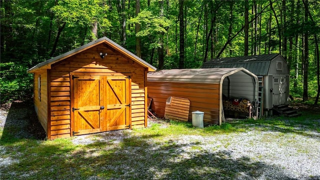 1457 Cheohee Valley Rd, Tamassee, SC 29686 - view of shed featuring a forest view