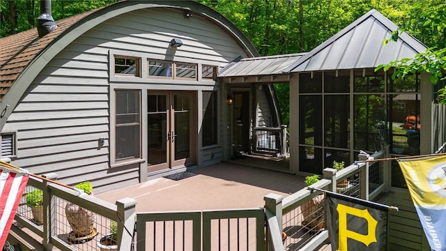1457 Cheohee Valley Rd, Tamassee, SC 29686 - back of property with french doors, a standing seam roof, a wooden deck, metal roof, and roof with shingles