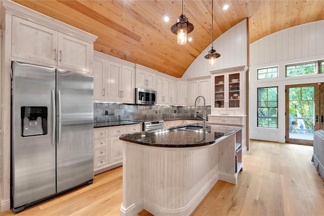 1457 Cheohee Valley Rd, Tamassee, SC 29686 - kitchen with appliances with stainless steel finishes, wood ceiling, a sink, light wood-style flooring, and dark stone countertops
