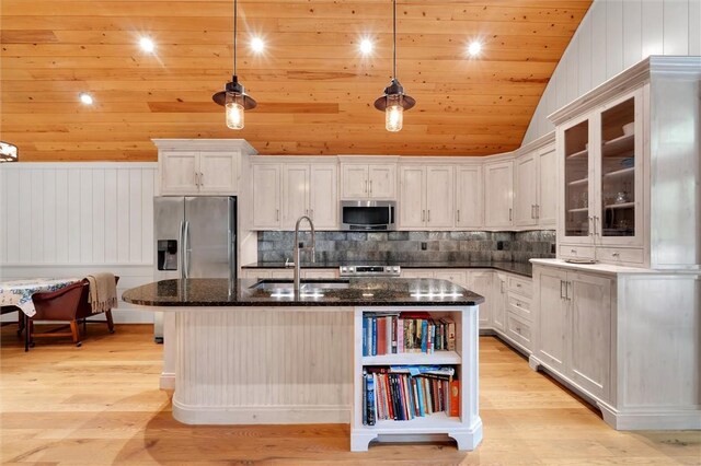 1457 Cheohee Valley Rd, Tamassee, SC 29686 - kitchen with stainless steel appliances, a sink, lofted ceiling, wooden ceiling, and a center island with sink
