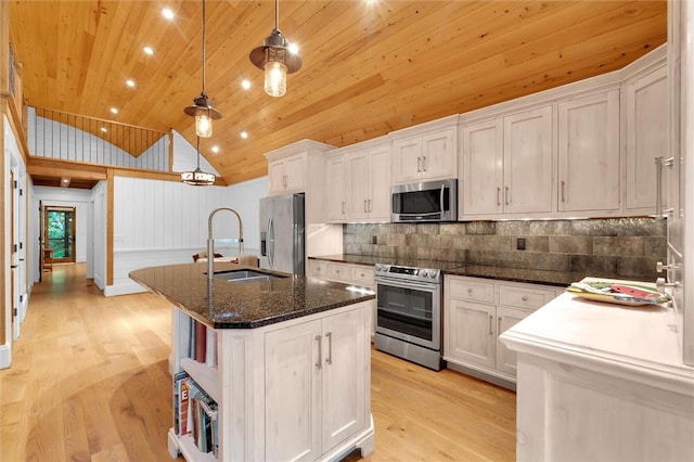 1457 Cheohee Valley Rd, Tamassee, SC 29686 - kitchen with appliances with stainless steel finishes, wood ceiling, vaulted ceiling, a sink, and an island with sink