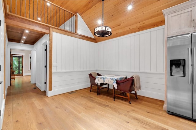 1457 Cheohee Valley Rd, Tamassee, SC 29686 - dining space with wood ceiling, vaulted ceiling, light wood-type flooring, and wood walls