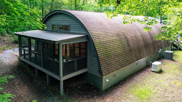 1457 Cheohee Valley Rd, Tamassee, SC 29686 - view of outdoor structure featuring a sunroom and cooling unit