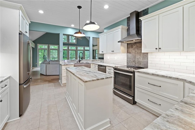 1029 Cross Creek Dr, Seneca, SC 29678 - kitchen featuring stainless steel appliances, wall chimney range hood, a peninsula, a sink, and decorative backsplash
