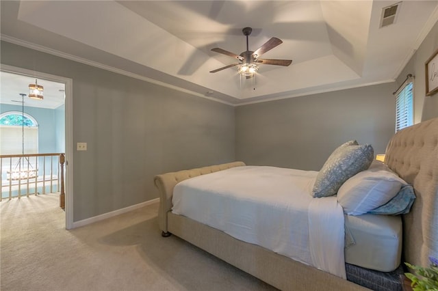 205 Shadow Oaks Dr, Easley, SC 29642 - bedroom featuring a tray ceiling, carpet, crown molding, baseboards, and ceiling fan