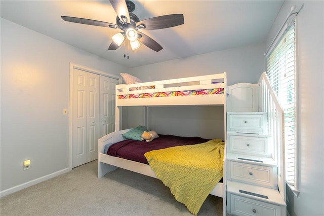 205 Shadow Oaks Dr, Easley, SC 29642 - bedroom with light colored carpet, a ceiling fan, baseboards, and a closet