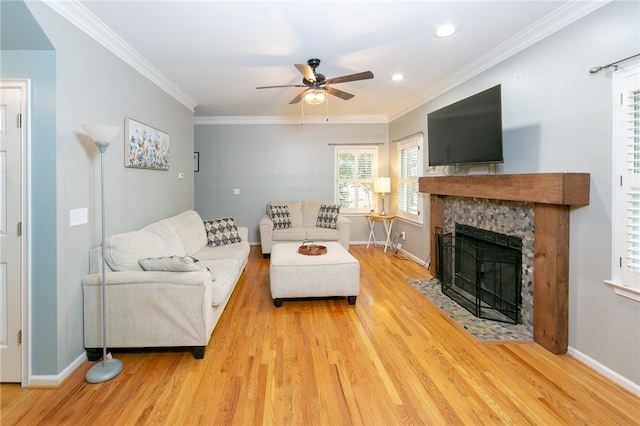 205 Shadow Oaks Dr, Easley, SC 29642 - living area with wood finished floors, a ceiling fan, a fireplace with flush hearth, ornamental molding, and baseboards