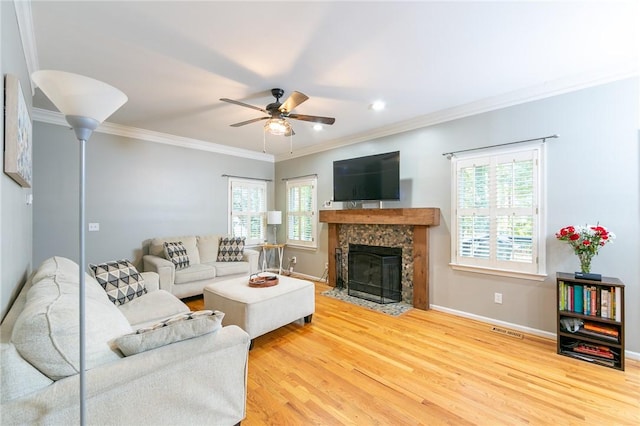 205 Shadow Oaks Dr, Easley, SC 29642 - living room featuring ornamental molding, ceiling fan, wood finished floors, a fireplace, and baseboards