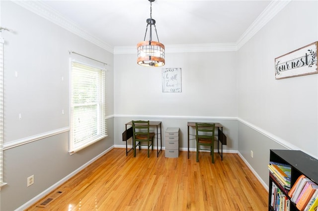 205 Shadow Oaks Dr, Easley, SC 29642 - dining space with wood finished floors, crown molding, and baseboards