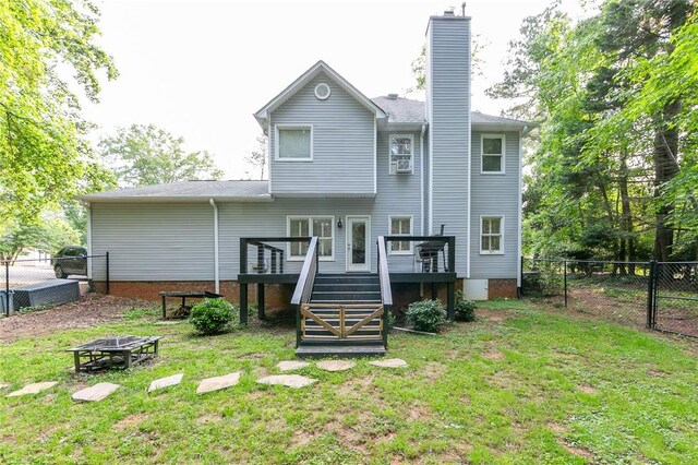 205 Shadow Oaks Dr, Easley, SC 29642 - rear view of property with a fire pit, stairs, a deck, and a chimney