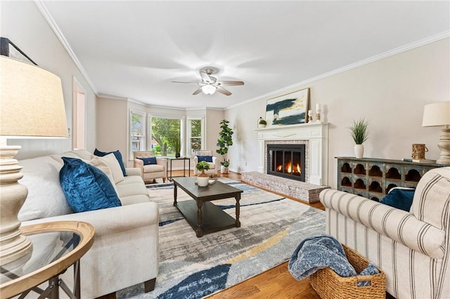 318 Chenoweth Dr, Simpsonville, SC 29681 - living area with a ceiling fan, crown molding, wood finished floors, and a fireplace