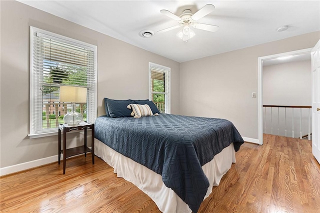 318 Chenoweth Dr, Simpsonville, SC 29681 - bedroom with light wood finished floors, baseboards, and a ceiling fan