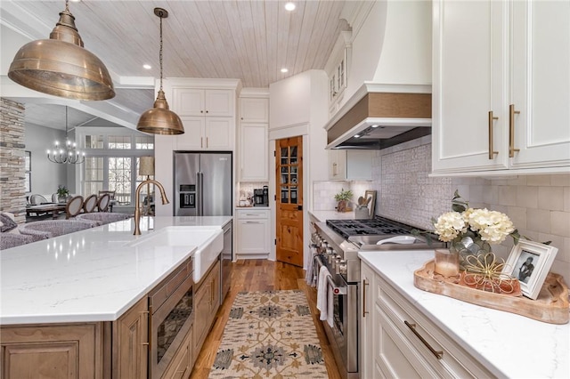 1819 Cross Creek Dr, Seneca, SC 29678 - kitchen featuring high quality appliances, custom exhaust hood, a sink, wood ceiling, and a chandelier