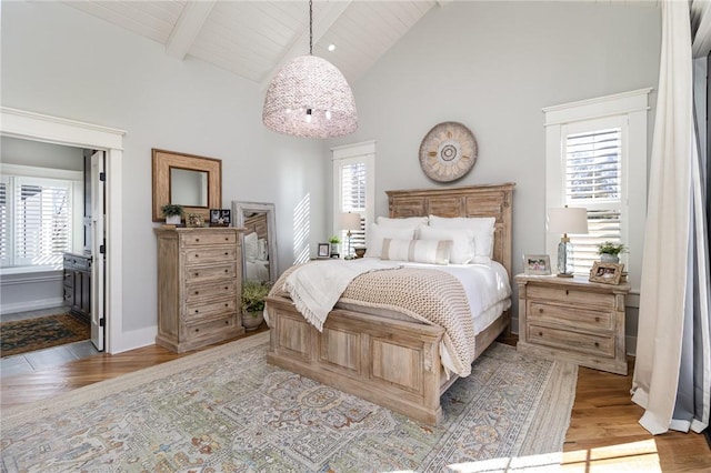 1819 Cross Creek Dr, Seneca, SC 29678 - bedroom featuring multiple windows, high vaulted ceiling, light wood-style floors, wooden ceiling with exposed beams, and ensuite bathroom