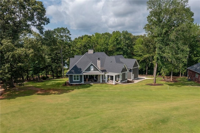 1819 Cross Creek Dr, Seneca, SC 29678 - back of property featuring a chimney and a yard