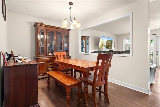 500 Concord Rd Unit A4, Anderson, SC 29621 - dining space with a chandelier, dark wood-style flooring, and baseboards