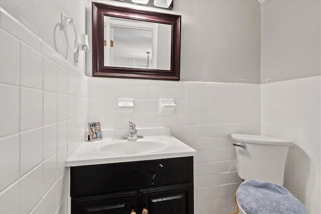500 Concord Rd Unit A4, Anderson, SC 29621 - bathroom with tile walls, vanity, toilet, and a wainscoted wall