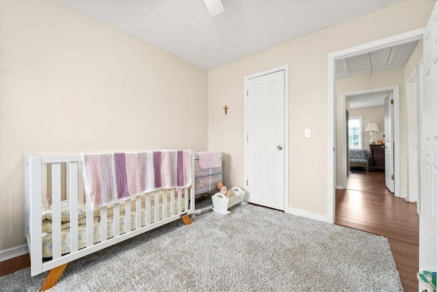 500 Concord Rd Unit A4, Anderson, SC 29621 - bedroom featuring attic access, baseboards, wood finished floors, and a ceiling fan