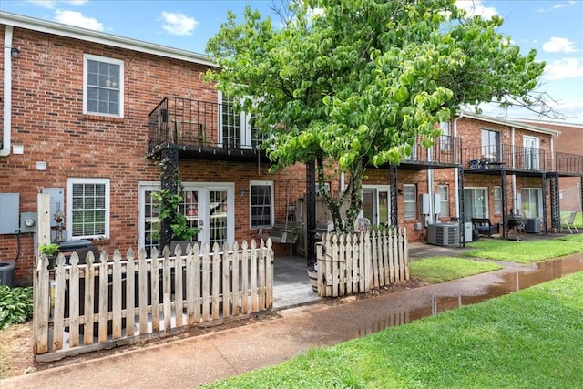 500 Concord Rd Unit A4, Anderson, SC 29621 - rear view of house with a balcony, brick siding, and cooling unit