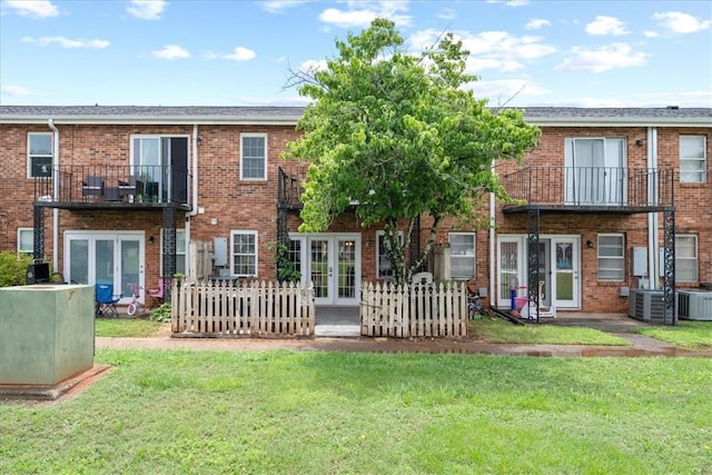 500 Concord Rd Unit A4, Anderson, SC 29621 - back of house featuring french doors, a balcony, and a lawn
