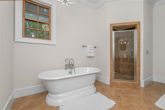 301 Augusta Way, Sunset, SC 29685 - bathroom with baseboards, a freestanding bath, a stall shower, crown molding, and tile patterned floors