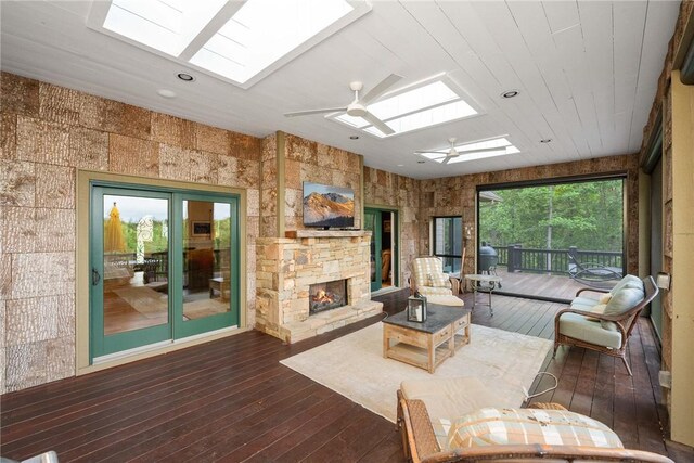 301 Augusta Way, Sunset, SC 29685 - living room featuring a skylight, hardwood / wood-style floors, a fireplace, ceiling fan, and recessed lighting
