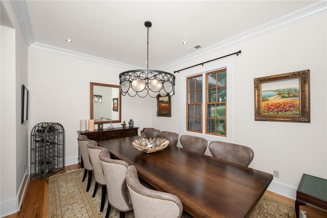 301 Augusta Way, Sunset, SC 29685 - dining room with wood finished floors, crown molding, baseboards, a chandelier, and recessed lighting