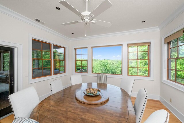 301 Augusta Way, Sunset, SC 29685 - dining room with crown molding, ceiling fan, baseboards, and light wood-type flooring