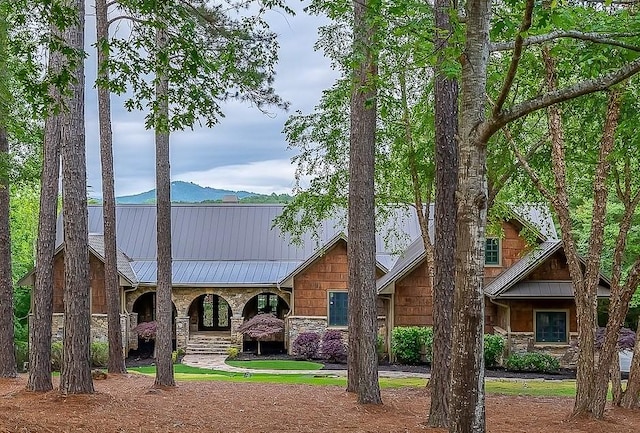 301 Augusta Way, Sunset, SC 29685 - view of front of property with stone siding, a standing seam roof, a mountain view, and metal roof