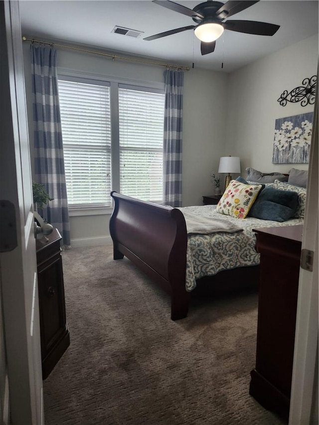 256 Chickadee Trl, Easley, SC 29642 - bedroom with dark carpet, baseboards, and ceiling fan