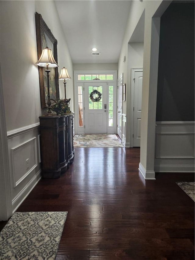 256 Chickadee Trl, Easley, SC 29642 - foyer with a decorative wall, hardwood / wood-style flooring, wainscoting, lofted ceiling, and recessed lighting