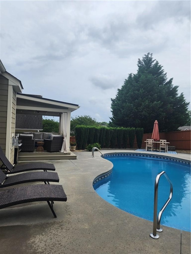 256 Chickadee Trl, Easley, SC 29642 - view of swimming pool with outdoor lounge area, a patio, and a fenced backyard