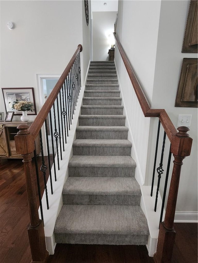 256 Chickadee Trl, Easley, SC 29642 - staircase with wood finished floors and baseboards