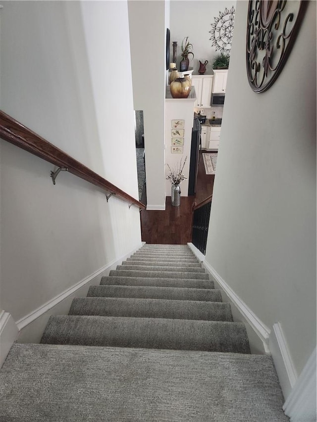 256 Chickadee Trl, Easley, SC 29642 - staircase with wood finished floors and baseboards