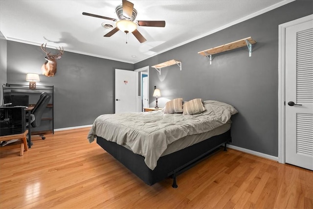 1122 Cox Rd, Anderson, SC 29621 - bedroom with wood finished floors, a desk, baseboards, crown molding, and ceiling fan