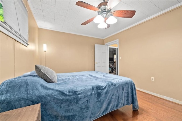 1122 Cox Rd, Anderson, SC 29621 - bedroom with wood finished floors, crown molding, baseboards, and a ceiling fan