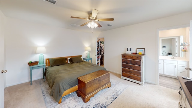112 Queens Mill Ct, Pendleton, SC 29670 - bedroom featuring light carpet, a closet, a walk in closet, baseboards, and a sink
