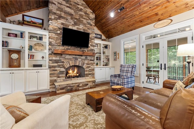 803 Gate View Ct, Seneca, SC 29672 - living room featuring wood ceiling, vaulted ceiling, wood finished floors, a stone fireplace, and built in shelves