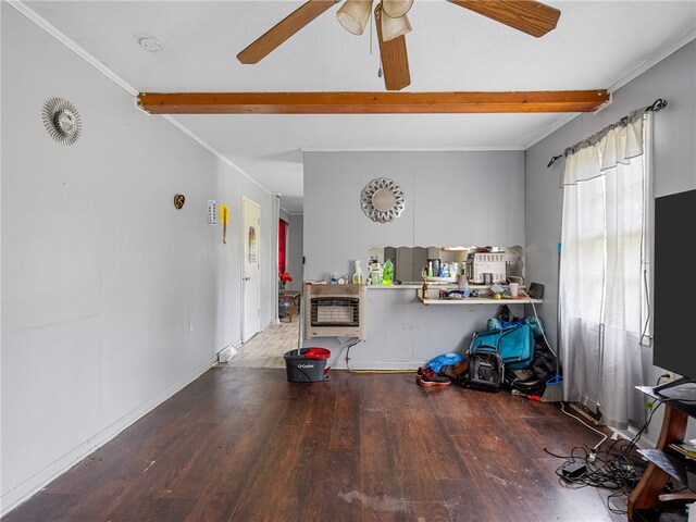 1225 Dogwood Ln, Clinton, SC 29325 - living area featuring beam ceiling, wood finished floors, ceiling fan, heating unit, and crown molding