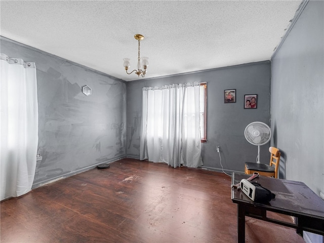 1225 Dogwood Ln, Clinton, SC 29325 - interior space featuring a textured ceiling, wood finished floors, a chandelier, and baseboards