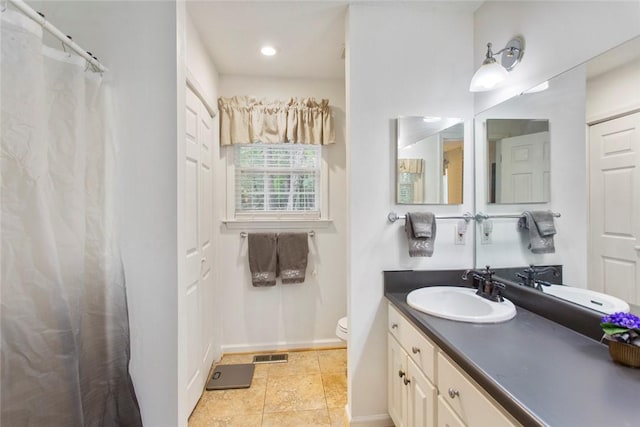 802 Pebble Ln, Anderson, SC 29621 - bathroom with vanity, toilet, baseboards, a shower with curtain, and recessed lighting