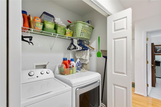 802 Pebble Ln, Anderson, SC 29621 - laundry room featuring washing machine and dryer and light wood finished floors