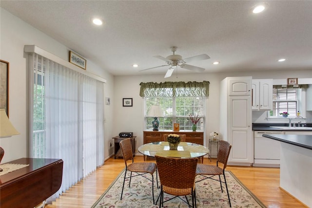 802 Pebble Ln, Anderson, SC 29621 - dining room featuring light wood-style floors, ceiling fan, and recessed lighting