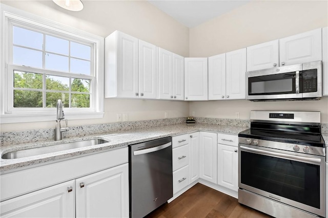 1316 E S 6th St, Seneca, SC 29678 - kitchen featuring appliances with stainless steel finishes, a sink, white cabinets, and dark wood finished floors